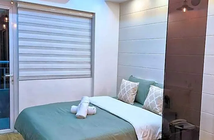 Cozy Retreat Balcony, Netflix, 100 Mbps -ggrace T1 호텔 마닐라